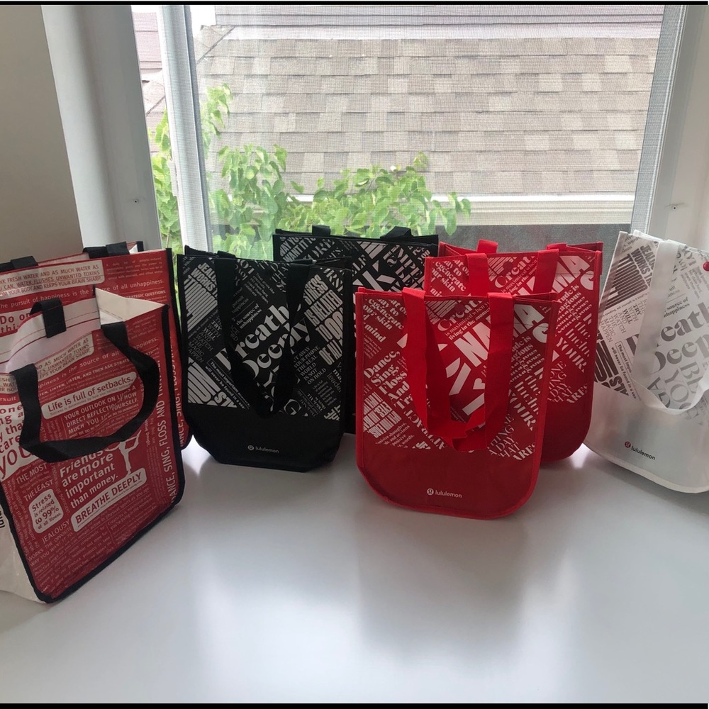 (8) Small Lululemon Bags